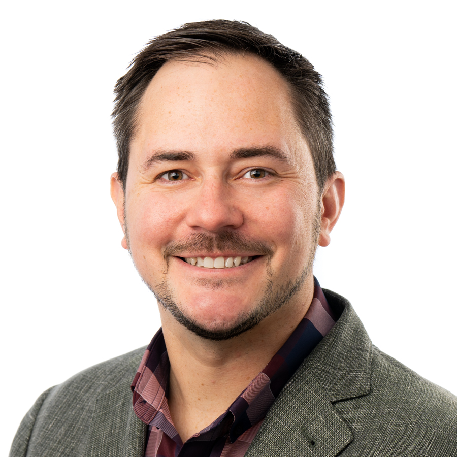 Headshot of Alex Brown, director at RM Cyber.